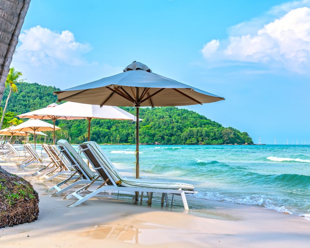 Sunbeds on tropical beach in Phu Quoc island