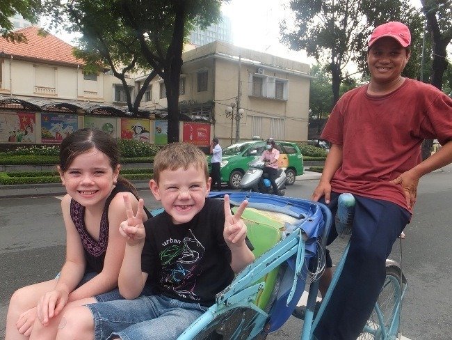 Ride a traditional cyclo with kids in Ho Chi Minh